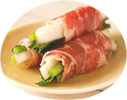 Tokyo spikenard and norabo greens wrapped in prosciutto